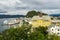 Alesund cityscape viewed from the Storhaugen park in Norway with the mount Aksla behind