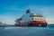 ALESUND, NORWAY - APRIL 04, 2018: Outdoor view of Hurtigruten coastal vessel KONG HARALD, is a daily passenger and