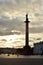 Alexander Column on cloud sky background at sunset.