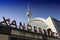 Alexanderplatz station sign and the TV Tower in Berlin