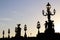 Alexandre III bridge Lamp posts Silhouettes at dusk in Paris france