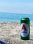Alfa beer can at the beach