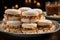 Alfajores - delicate sandwich cookies with a dulce de leche filling, elegantly presented with powdered sugar and rich chocolate,