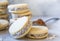 `Alfajores` delicious traditional Argentine sandwich cookies filled with caramelized milk - `dolce de leche`, and shredded coconut