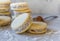 `Alfajores` delicious traditional Argentine sandwich cookies filled with caramelized milk - `dolce de leche`, and shredded coconut