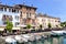 Alfresco cafes and restaurants in Italian historic town of Desenzano , Lake Garda