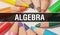 Algebra concept banner with texture from colorful items of education, science objects and 1 september School supplies. algebra