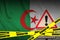 Algeria flag and Covid-19 quarantine yellow tape. Coronavirus or 2019-nCov virus