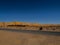 Algerian Sahara desert oasis of Thaghit Bechar  Sand dunes behind the road