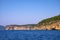 Alghero, Sardinia, Italy - Faro di Capo Caccia lighthouse at the limestone cliffs of the Capo Caccia cape at the Gulf of Alghero