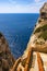 Alghero, Sardinia Italy - Panoramic view of the Gulf of Alghero with cliffs of Cape Cappo Caccia over the Neptuneâ€™s Grotto