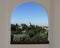 Alhambra through arch window. Islamic architecture