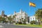 ALICANTE, SPAIN - NOVEMBER 30, 2019: Alicante Explanada de Espana with Casa Carbonell building and spanish flag