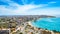 Alicante town from Serra Grossa mountain. Cabo de la Huerta and San Juan district with high buildings, roads, beaches