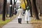 alien couple, walking hand-in-hand on romantic stroll through park