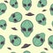 Alien Face Seamless Pattern Cartoon. Green Big Eye Extraterrestrial humanoid backdrop. Wallpaper of space character