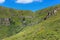 Alien, rocky, sunlit landscape and almost dried up Kopren waterfall