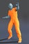 Alien worker or prisoner in orange coveralls