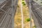 Alienated image of a footpath running between two railway tracks for trains