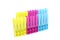 Aligned clothespins, on yellow, pink and blue colors, isolated on white