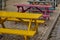 Aligned colorful wooden tables