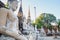 Aligned Sitting Buddha Statues with ancient ruin of temple at wa