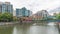 Alkaff Bridge on the Singapore River at Robertson Quay with dark gray clouds timelapse hyperlapse