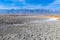 Alkali flats of dry Owens Lake with the Sierra Nevada mountains near Keeler, California, USA