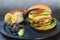 All-American burger.  A double wagyu fat and chuck blend patty and bacon ketchup in a brioche bun.  Served with Mexican corn and