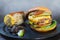 All-American burger.  A double wagyu fat and chuck blend patty and bacon ketchup in a brioche bun.  Served with Mexican corn and