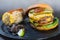 All-American burger.  A double wagyu fat and chuck blend patty and bacon ketchup in a brioche bun.  Served with Mexican corn and