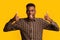 All Is Great. Cheerful african american guy showing thumbs up