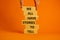 We all have stories to tell symbol. Wooden blocks with words `We all have stories to tell`. Businessman hand. Beautiful orange