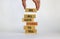 We all have stories to tell symbol. Wooden blocks with words `We all have stories to tell`. Businessman hand. Beautiful white
