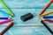 All pencil colorful sharpener on blurred wooden table