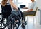 We all put in the same amount of work. Shot of a businesswoman with disabilities sitting with colleagues in the office.