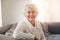 All smiles throughout her senior years. Portrait of a senior woman relaxing at home.