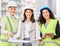 All things go according to plan. Cropped portrait of three attractive female engineers looking at blueprints while