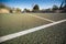 All-weather Tennis court close up with blue sky