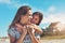 Is this all you wanna do today. a young mother and her daughter enjoying a day at the beach.