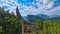 Allakogel - Summit monument shaped as half moon on top of peak Allakogel. Scenic view of majestic mountains