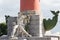 Allegorical sculpture of the Dnieper River and rostra at the base of the rostral column in St. Petersburg, Russia