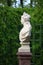 Allegory of the World. Marble bust of the 18th century on a granite pedestal in the Summer Garden, St. Petersburg