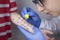 An allergist doctor makes a skin test for allergies. The boy is being examined in the laboratory, waiting for a reaction to