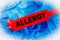 Allergy Bracelet Over Blue Protective Glove