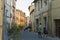 Alley of the characteristic medieval village of San Quirico d`Orcia, a town of ancient Etruscan origins in Siena, Tuscany Italy