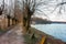 Alley on the lake, old observation deck on the pond, observation gazebo on the lake