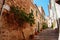 Alley with stairs and old stone houses in Fornalutx on spanish island Mallorca