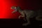 Allosaurus with spot light on the head and red light