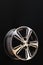 Alloy rim on black background, alloy wheels closeup. The elements spokes